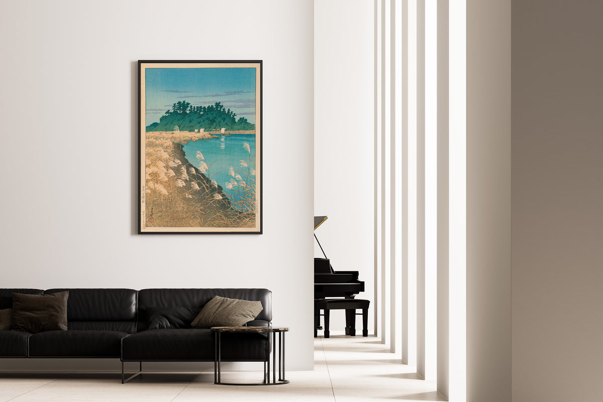 Framed art print of Late Autumn in Ichikawa by Kawase Hasui, on the wall of a minimal living room