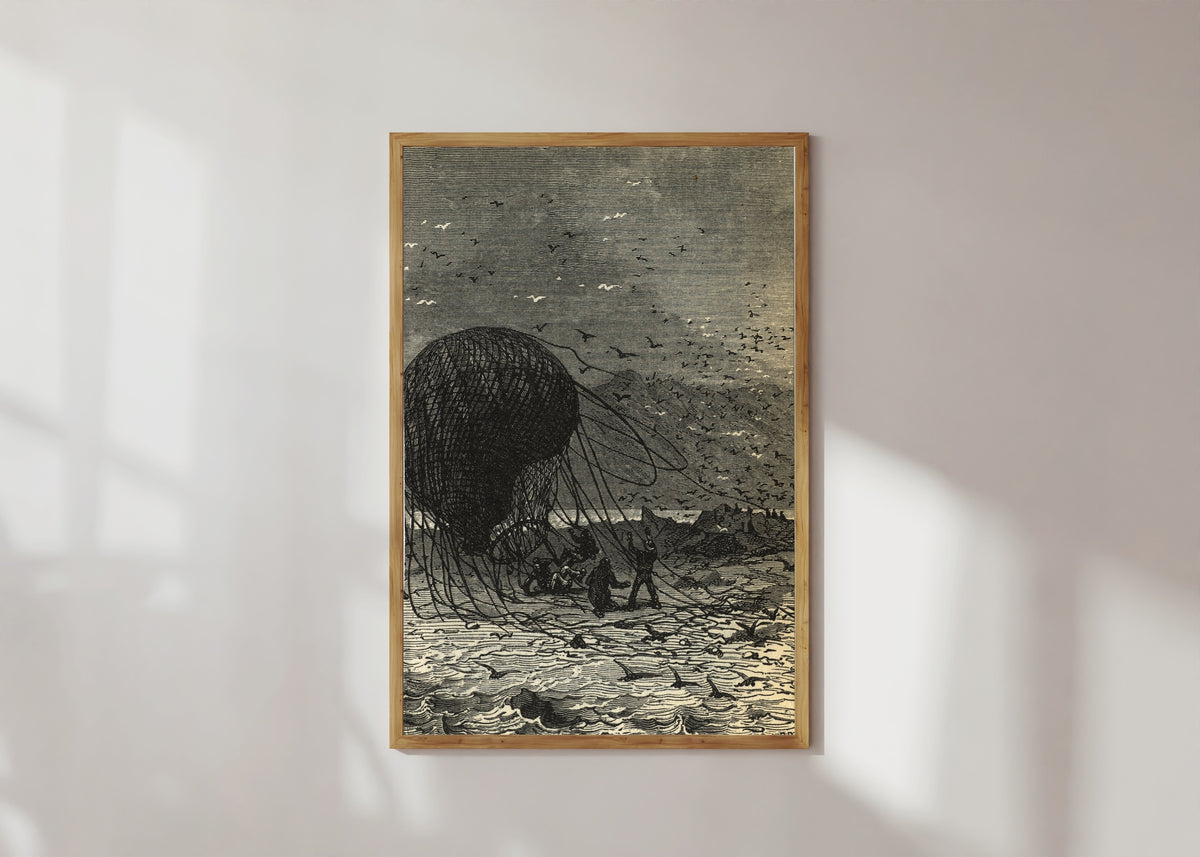 Framed art print of Le ballon retombait définitivement sur le sable (The balloon fell back for… by Jules Férat, in a light wood frame on a sunlit white wall