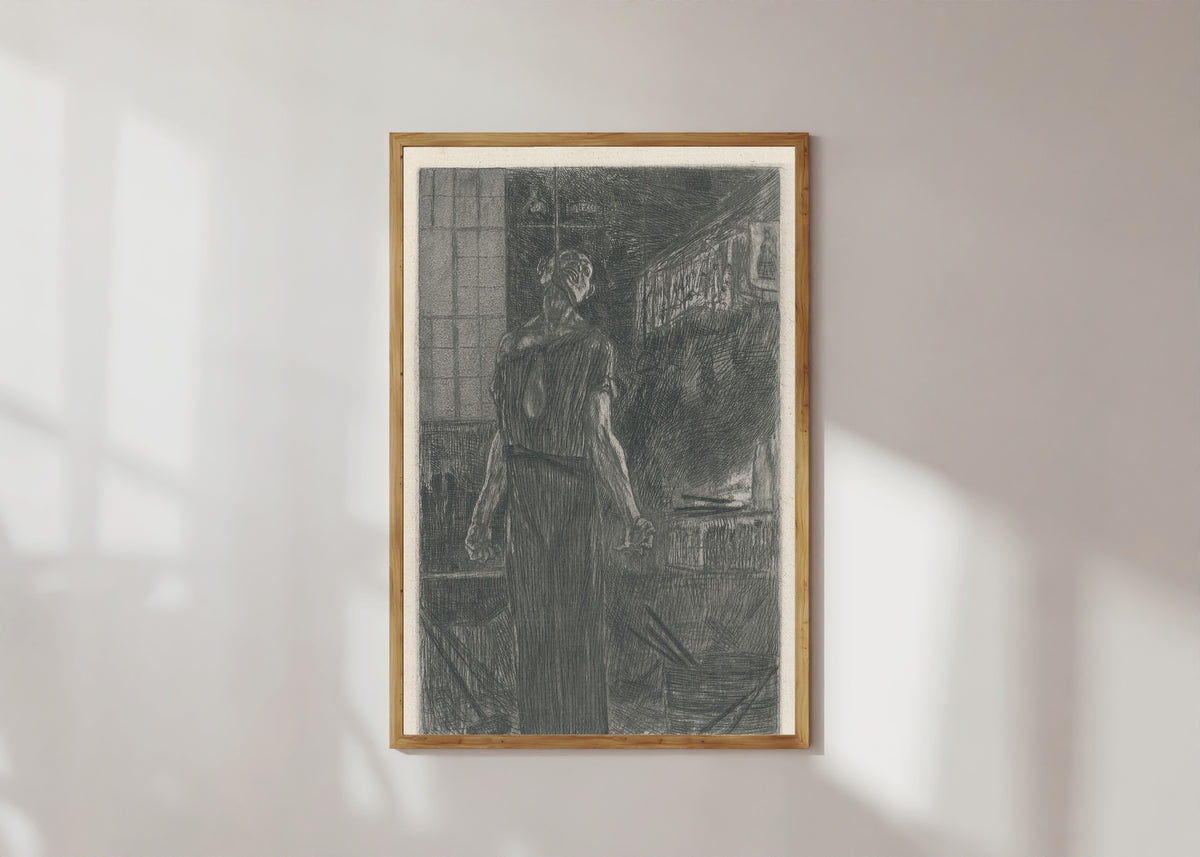 Framed art print of Le pendu dans la forge (2nd state) by Félicien Rops, in a light wood frame on a sunlit white wall