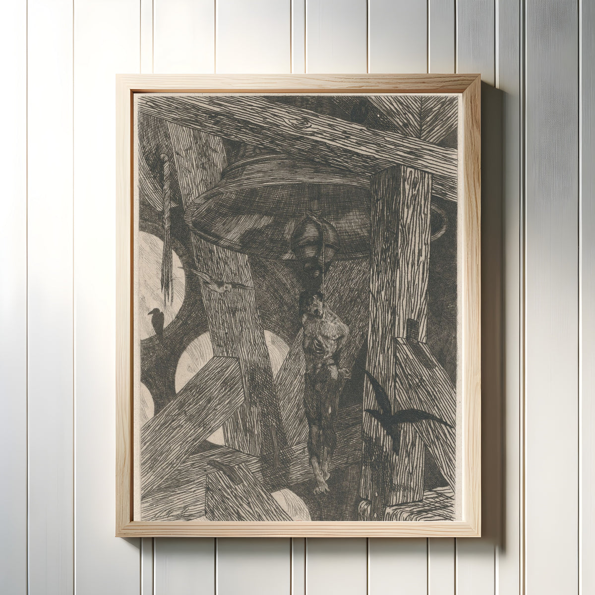 Framed art print of Le pendu à la cloche by Félicien Rops, in a light wood frame on a white panelled wall
