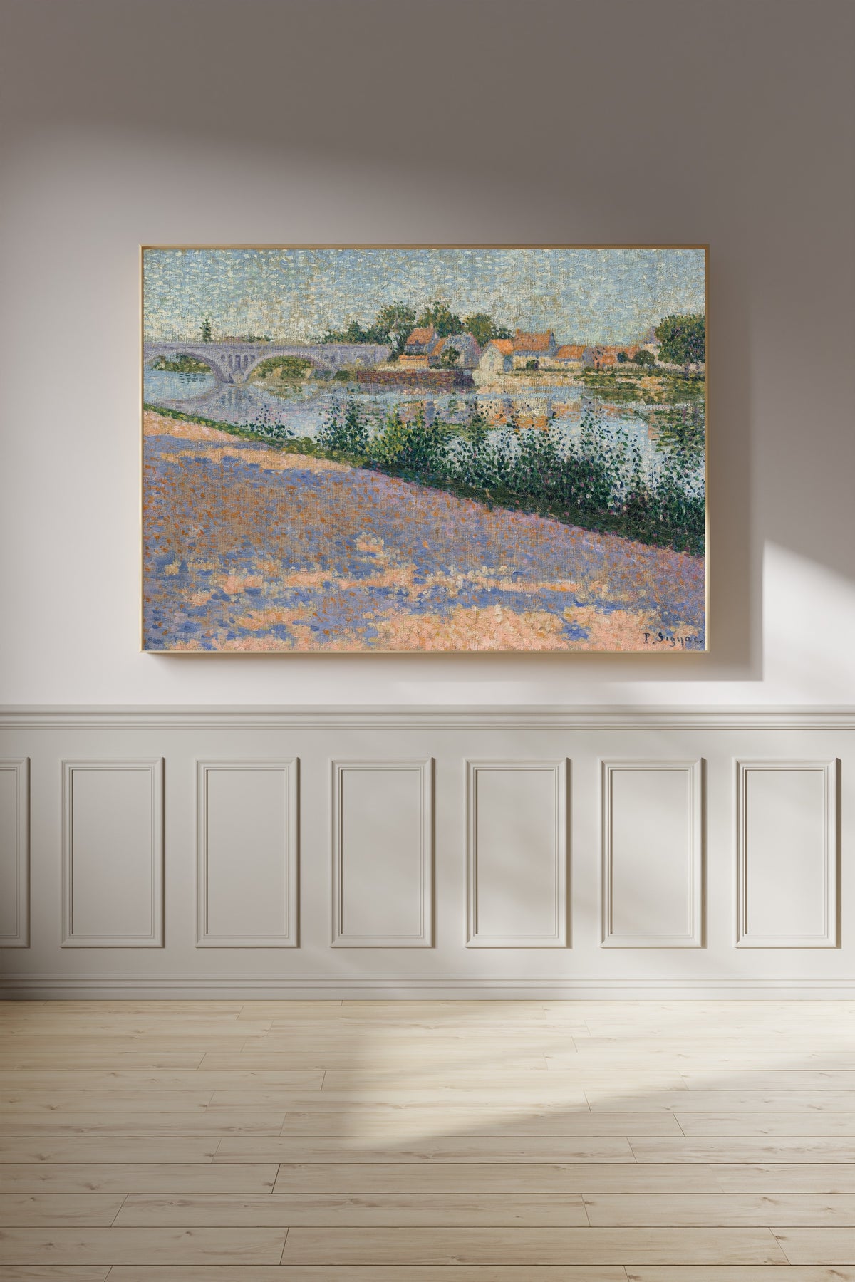 Framed art print of Les Andelys, Port Morin by Paul Signac, on a panelled wall in afternoon light