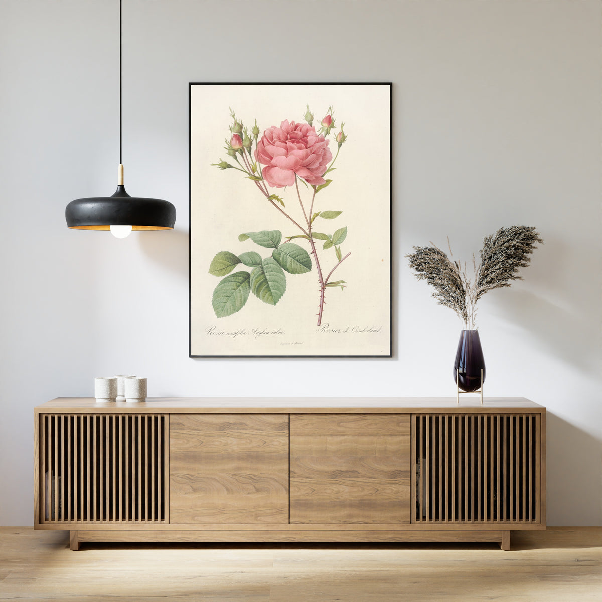 Framed art print of Les Roses: Rosa Centifolia Anglica Rubra by Pierre-Joseph Redouté, above a slatted wood sideboard