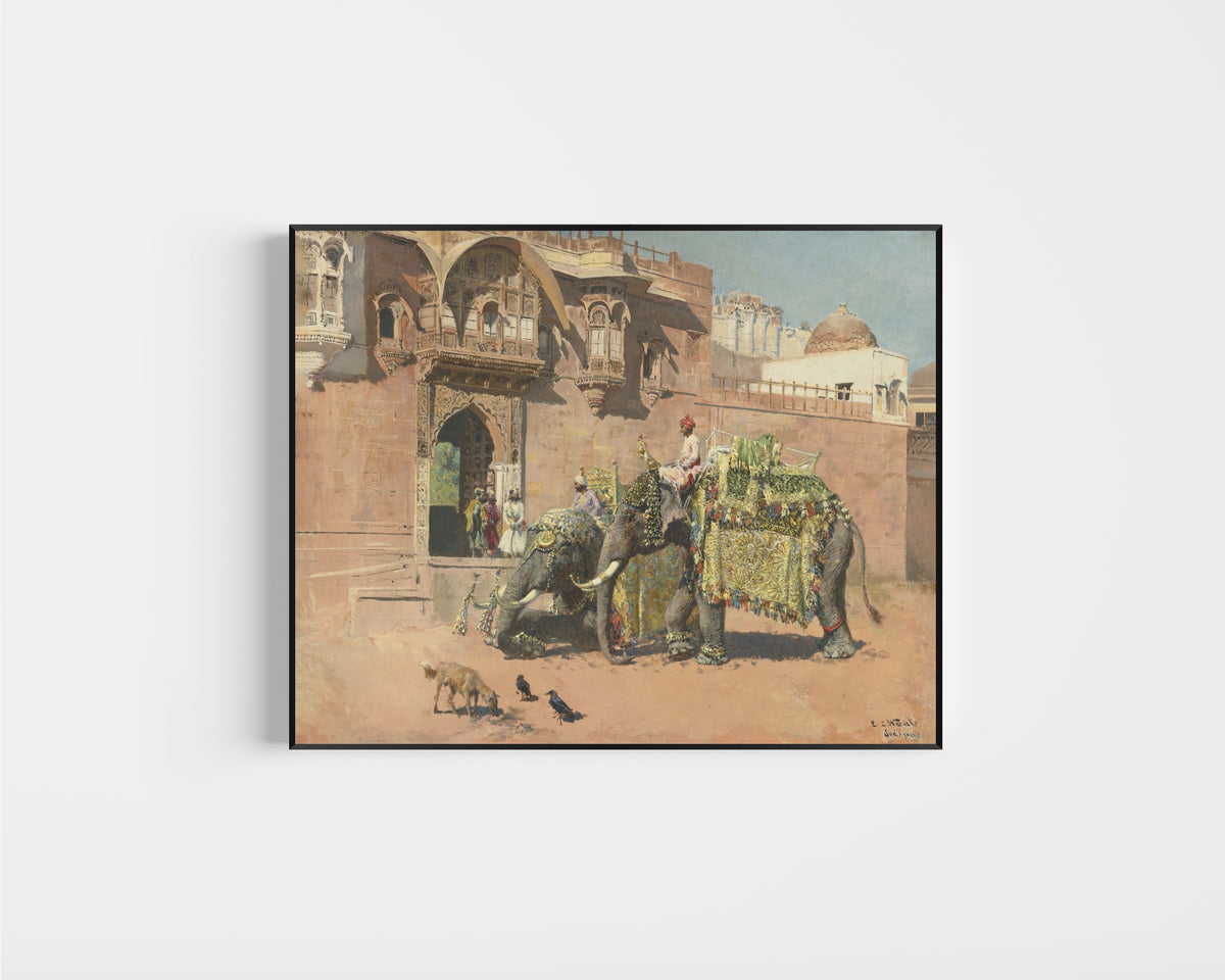 Framed art print of Les éléphants du Rajah de Jodhpore by Edwin Lord Weeks, in a slim black frame on a plain white wall