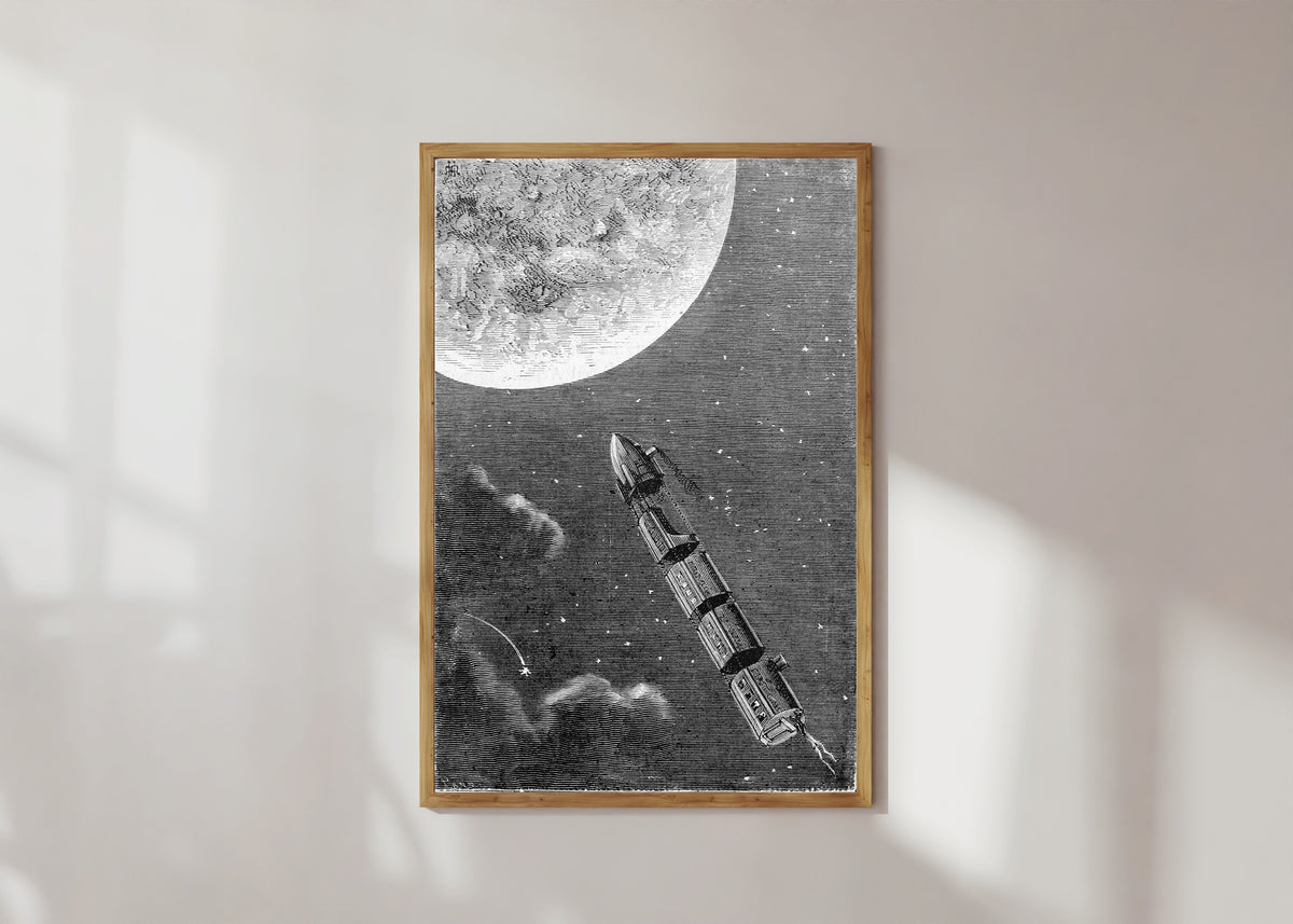 Framed art print of Les trains de projectiles pour la Lune (The projectile trains for the… by Henri de Montaut, in a light wood frame on a sunlit white wall