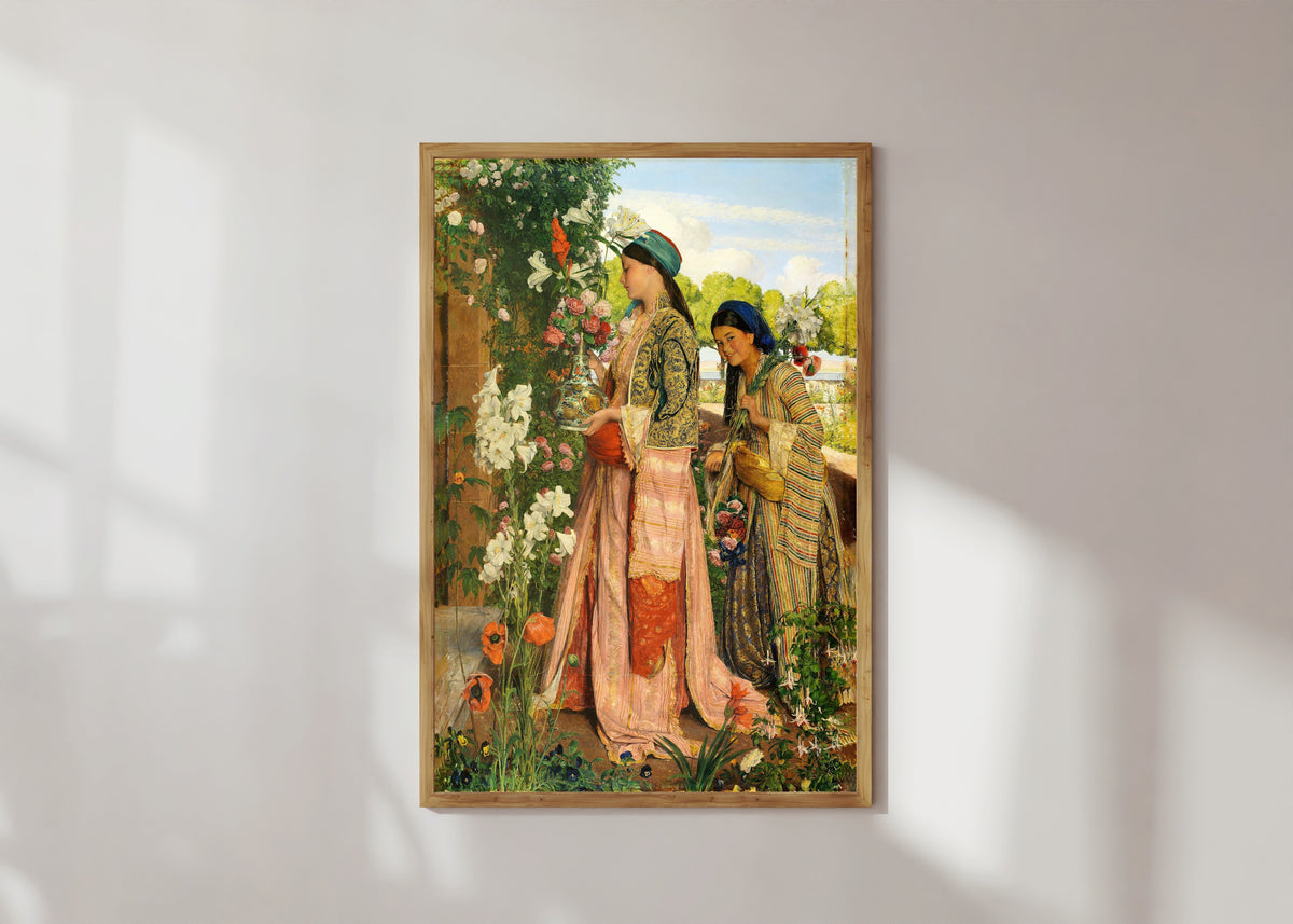 Framed art print of Lilium Auratum by John Frederick Lewis, in a light wood frame on a sunlit white wall