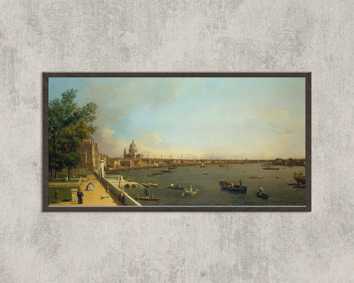 Framed art print of London – The Thames from Somerset House Terrace towards the City by Canaletto, in a wide black frame on a concrete wall
