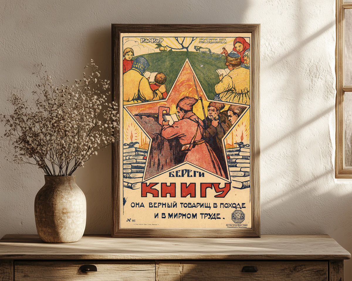 Framed art print of Look after the book: it is a faithful comrade on the march and in…, in a dark wood frame leaning on a rustic console beside dried flowers