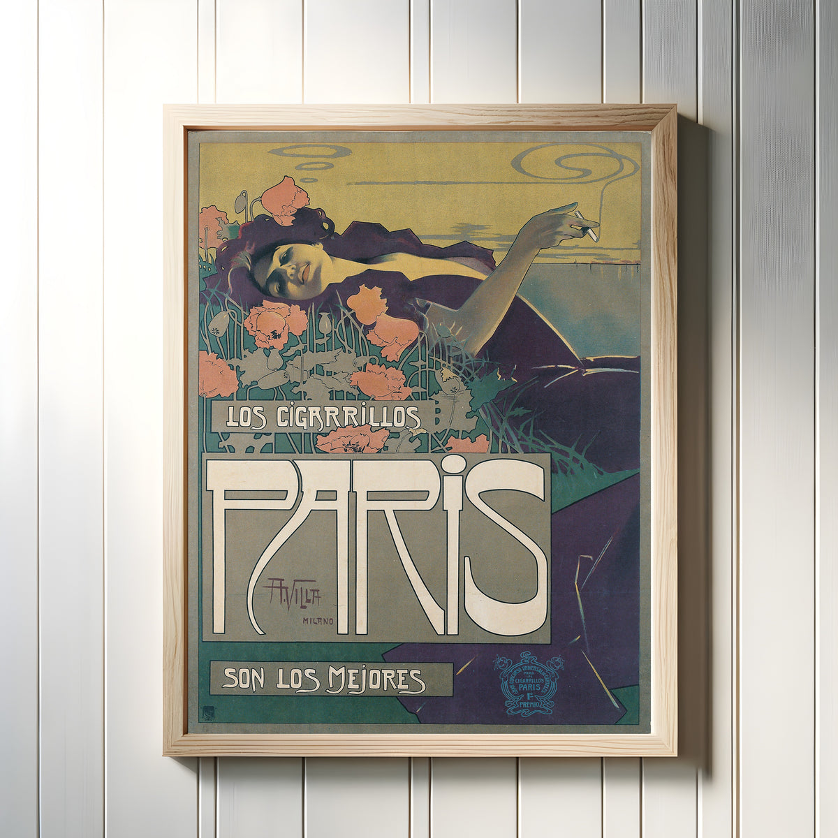 Framed art print of Los Cigarrillos Paris by Aleardo Villa, in a light wood frame on a white panelled wall