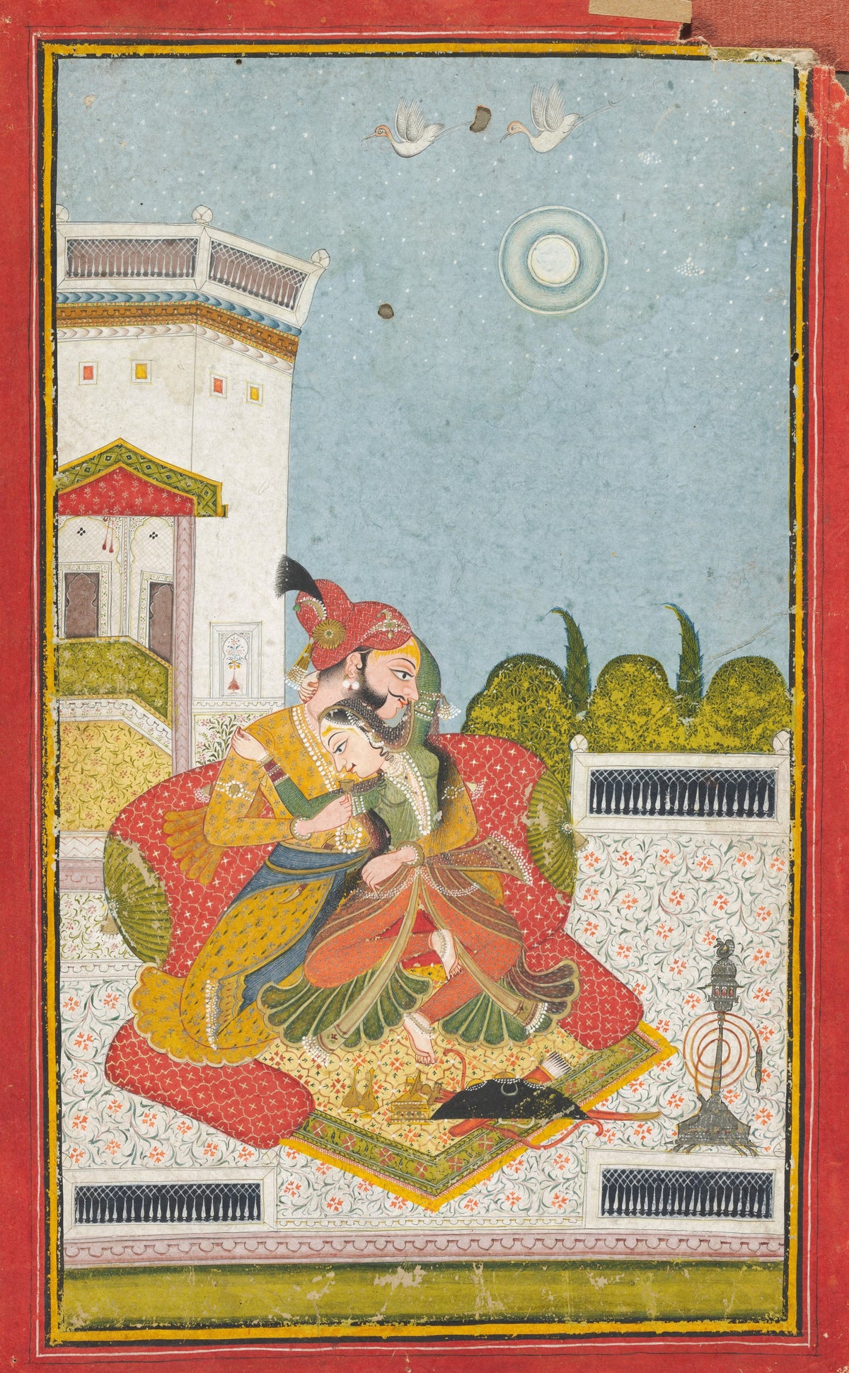 Lovers Embracing (Raga Malkaus) by Bundi school — A bearded man and a woman embrace on cushions under a ringed full moon