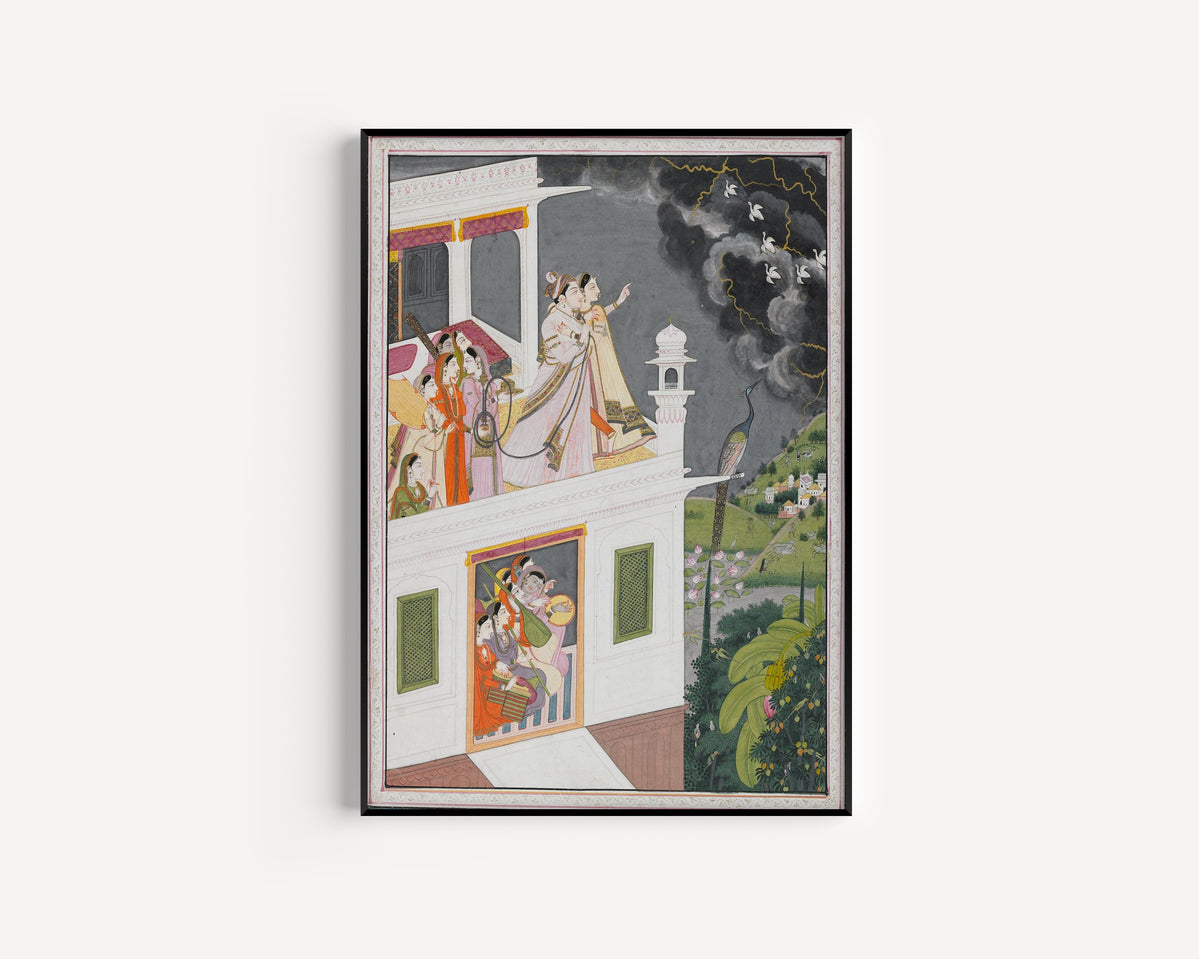 Framed art print of Lovers Watching an Approaching Thunderstorm by Kangra school, in a slim black frame on a plain white wall