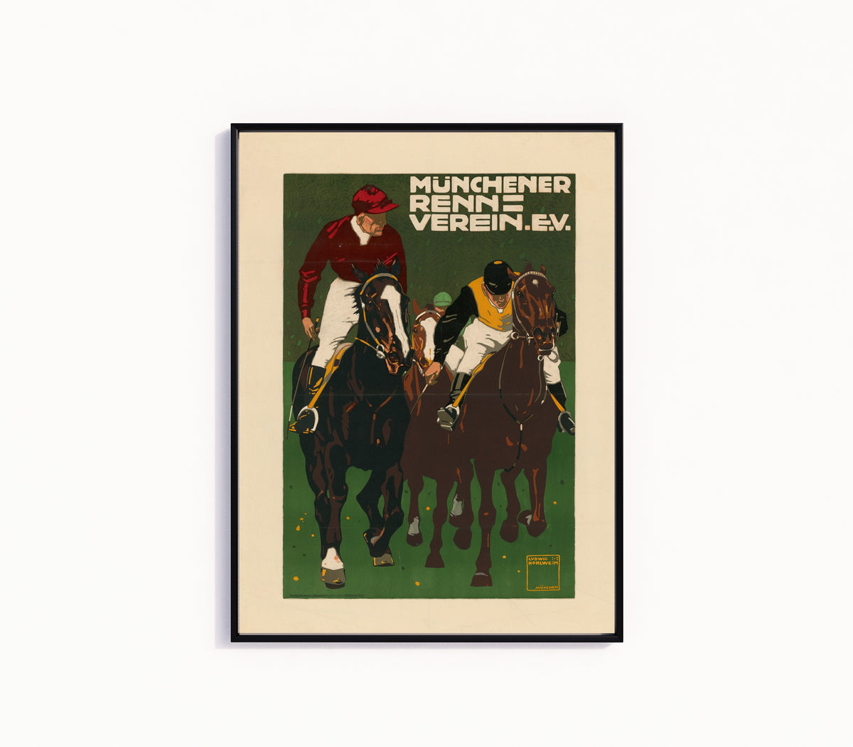 Framed art print of Münchener Rennverein e.V. by Ludwig Hohlwein, in a slim black frame on a plain white wall
