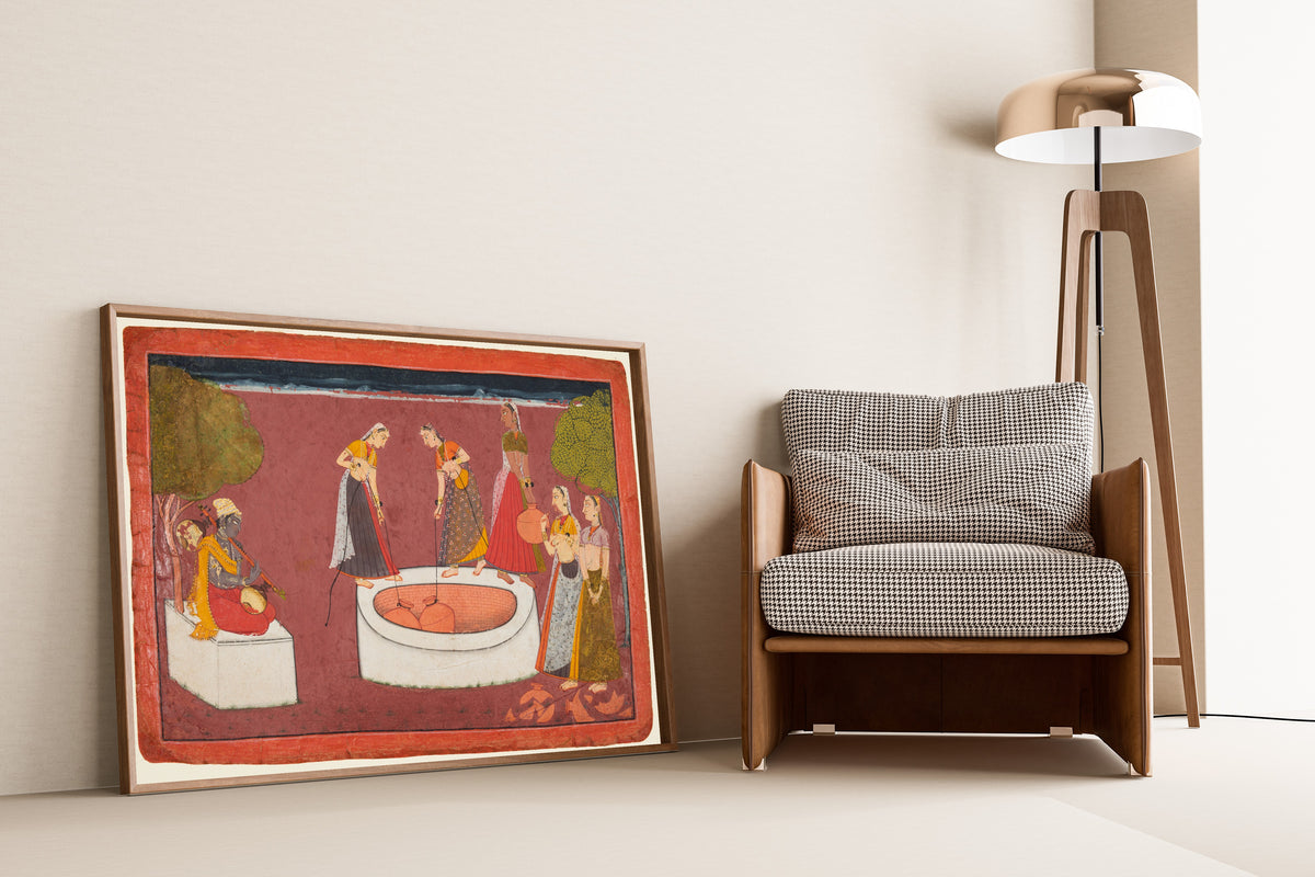 Framed art print of Madhava plays his vina before five women drawing water from a… by Pahari school, leaning against a wall beside an armchair and a floor lamp