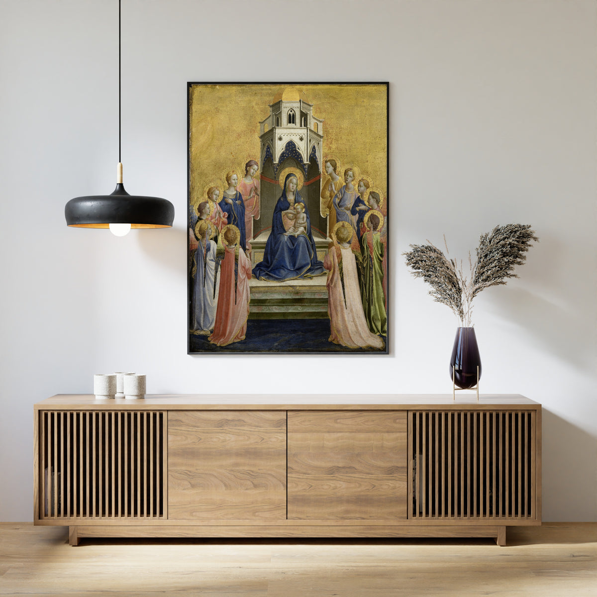 Framed art print of Madonna and Child Enthroned and Twelve Angels by Fra Angelico, above a slatted wood sideboard