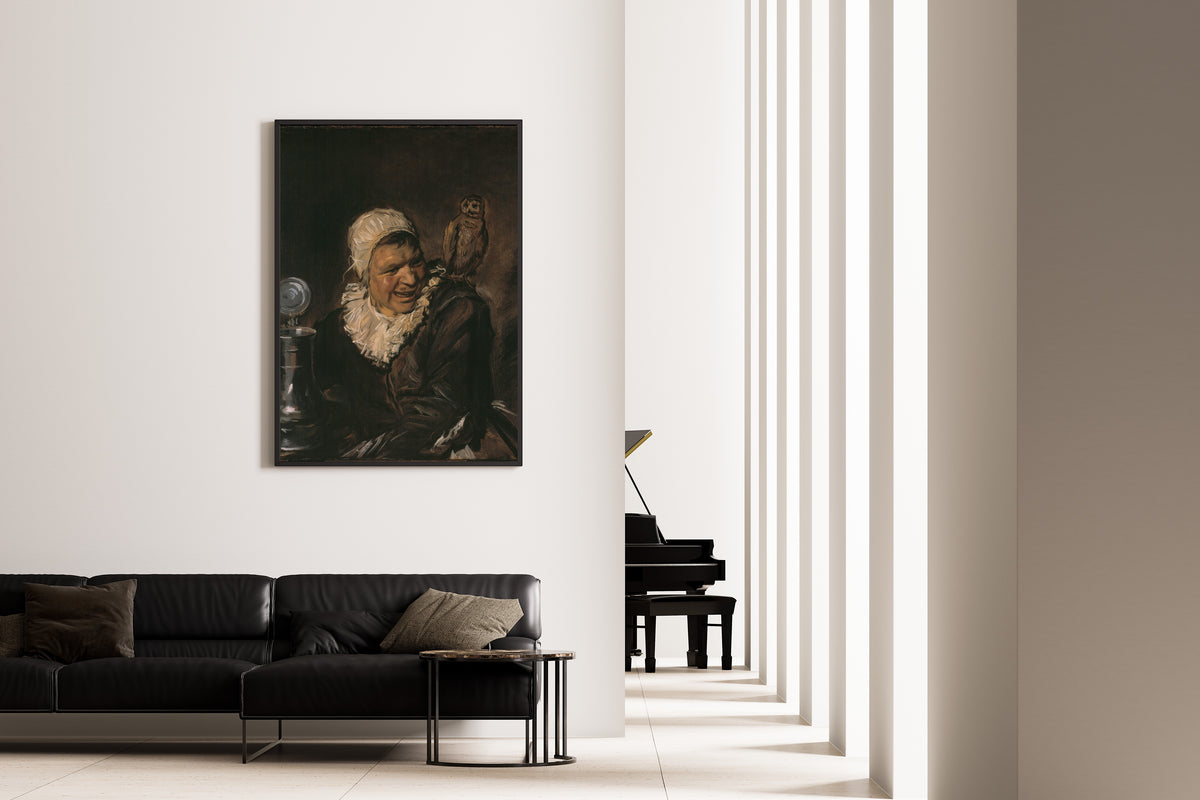 Framed art print of Malle Babbe by Frans Hals, on the wall of a minimal living room