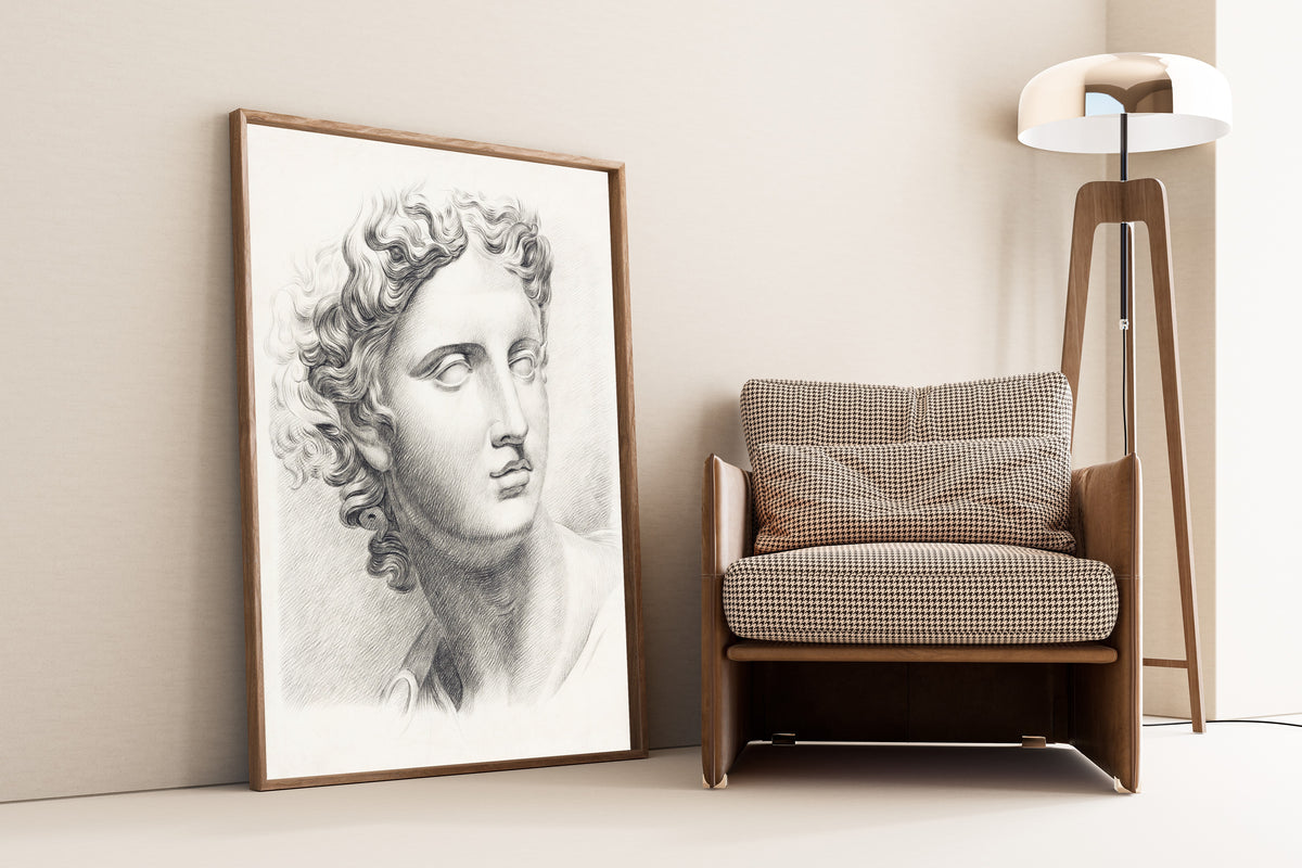 Man's Head by Johannes Tavenraat — framed and leaning against a wall beside an armchair and a floor lamp