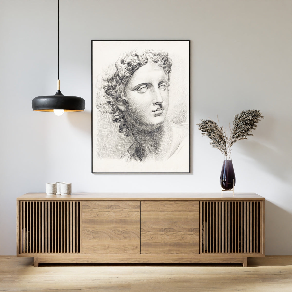 Man's Head by Johannes Tavenraat — framed above a slatted wood sideboard