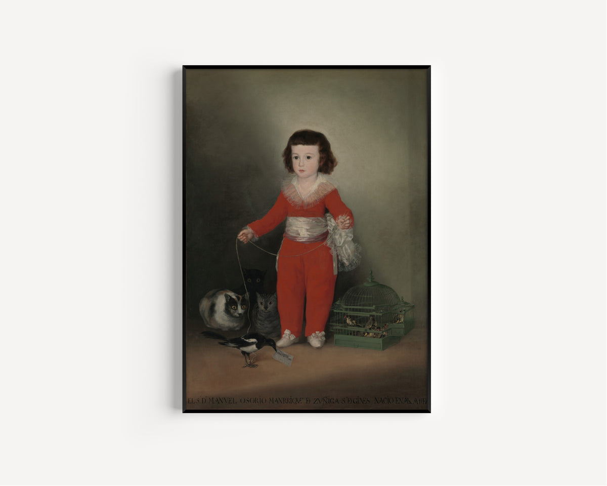 Framed art print of Manuel Osorio Manrique de Zuñiga (1784–1792) by Francisco de Goya, in a slim black frame on a plain white wall