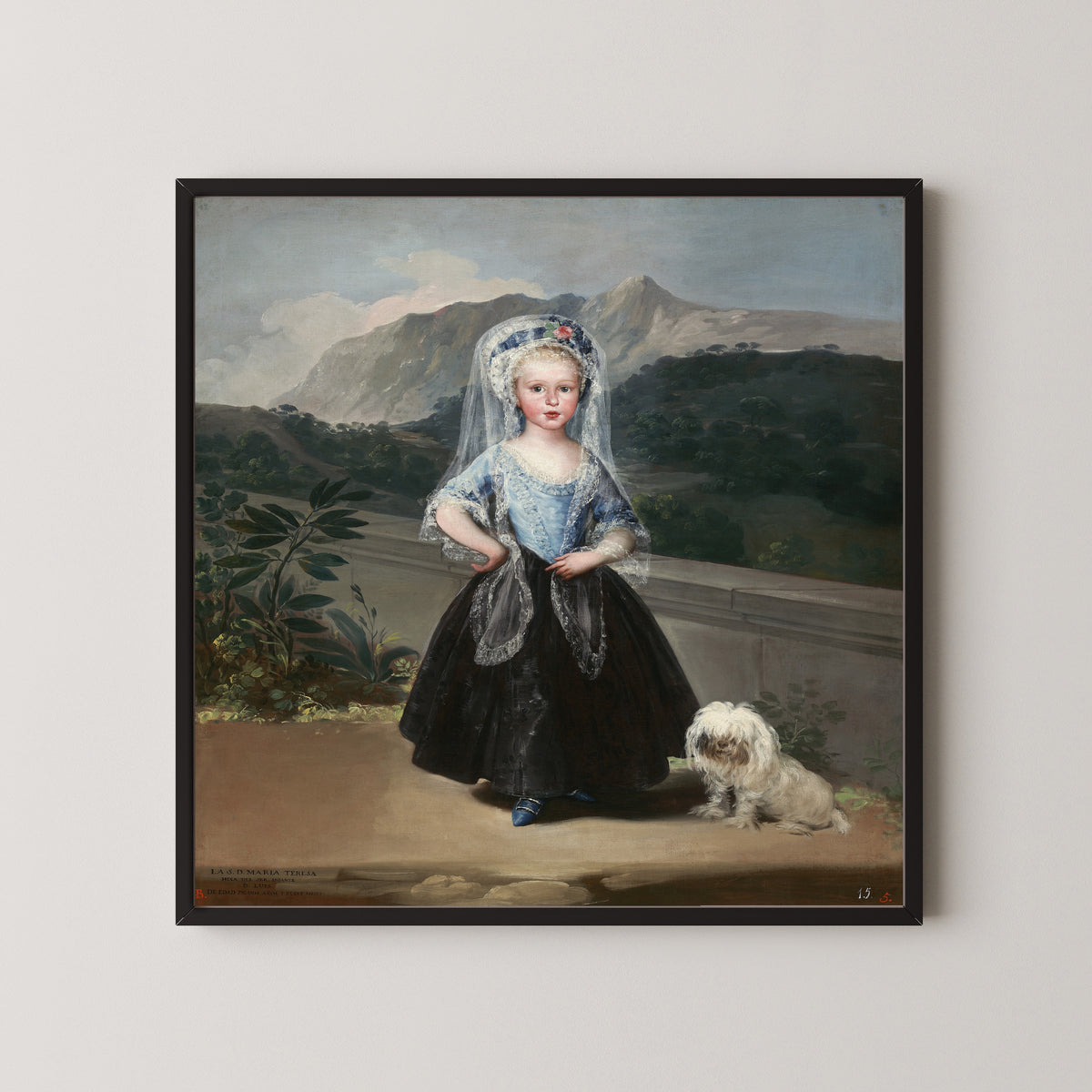 Framed art print of María Teresa de Borbón y Vallabriga, later Condesa de Chinchón by Francisco de Goya, in a black frame on a pale wall