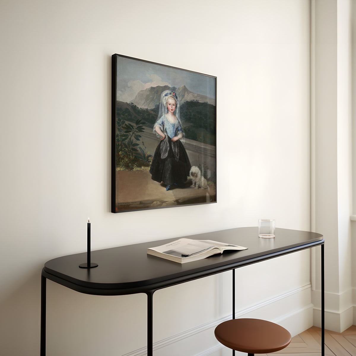 Framed art print of María Teresa de Borbón y Vallabriga, later Condesa de Chinchón by Francisco de Goya, above a slim black console table