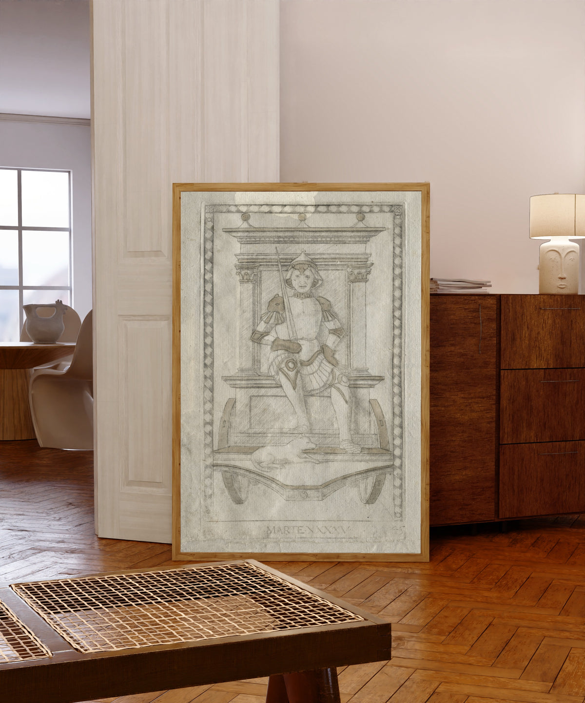 Framed art print of Mars (from the Tarocchi, Series A… by Master of the E-Series Tarocchi, in a light wood frame leaning in a warm room with a parquet floor