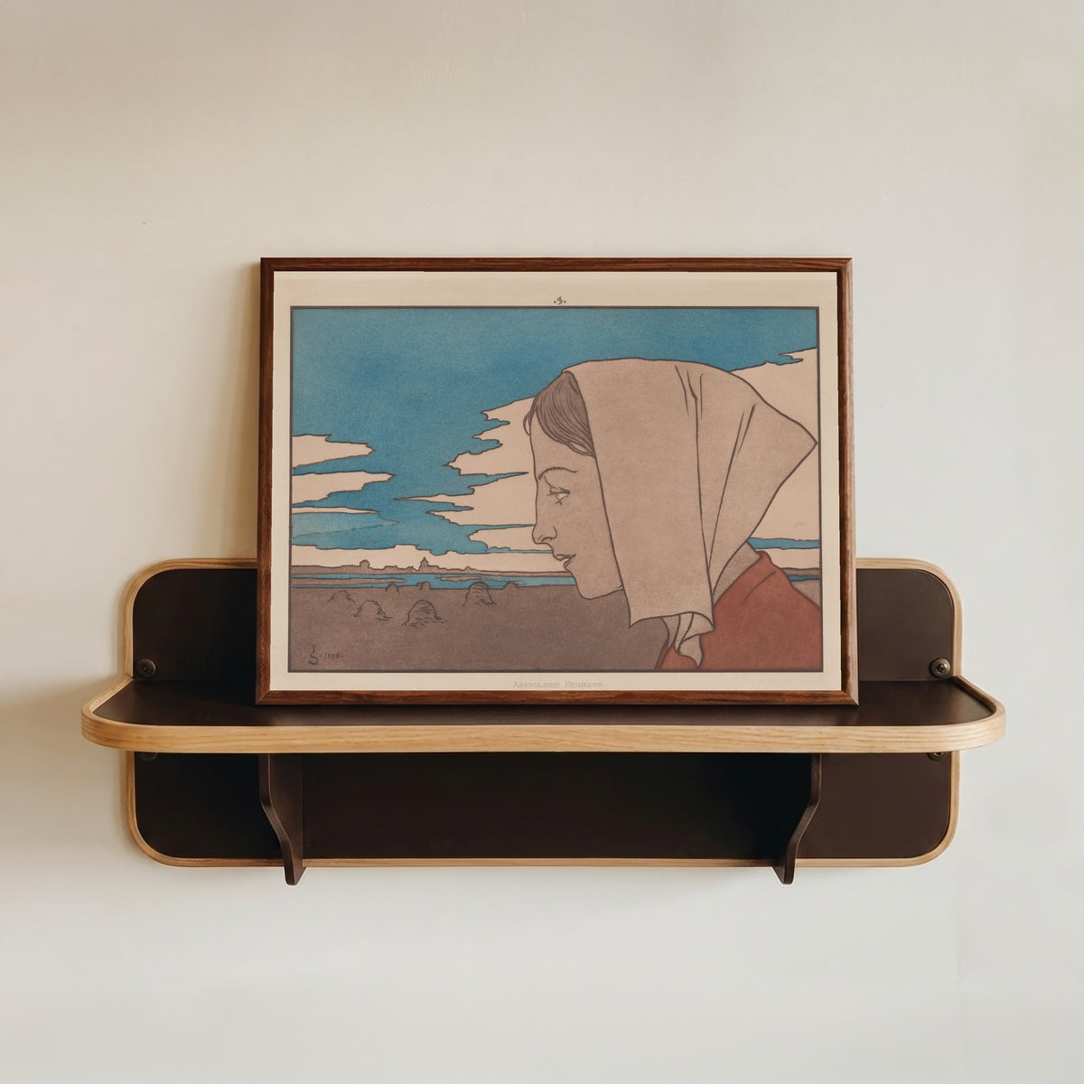 Framed art print of Meine Harmonie: Plate 9 by Joseph Sattler, in a dark wood frame resting on a wall shelf