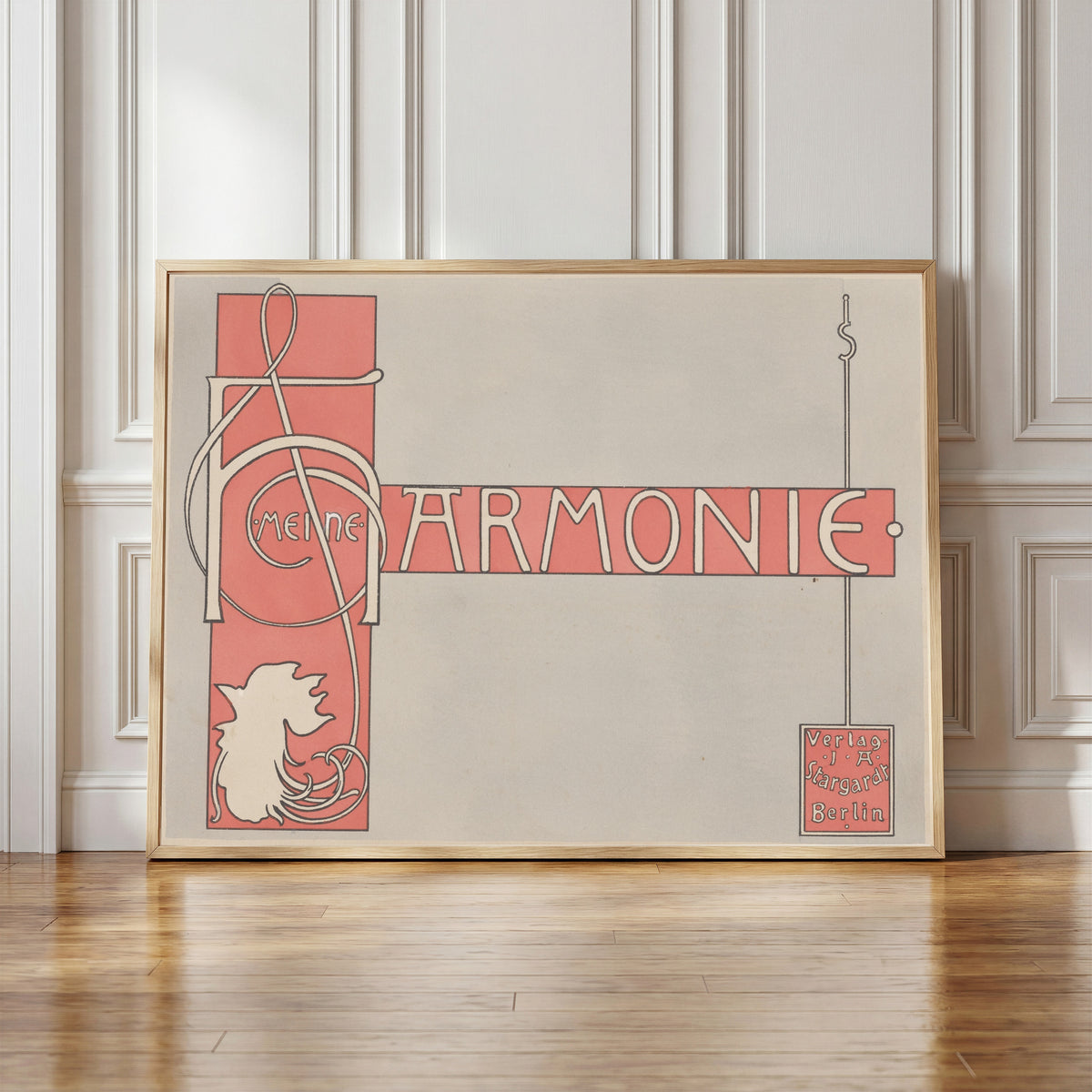 Framed art print of Meine Harmonie: Title Page by Joseph Sattler, in a light wood frame leaning against a panelled white wall