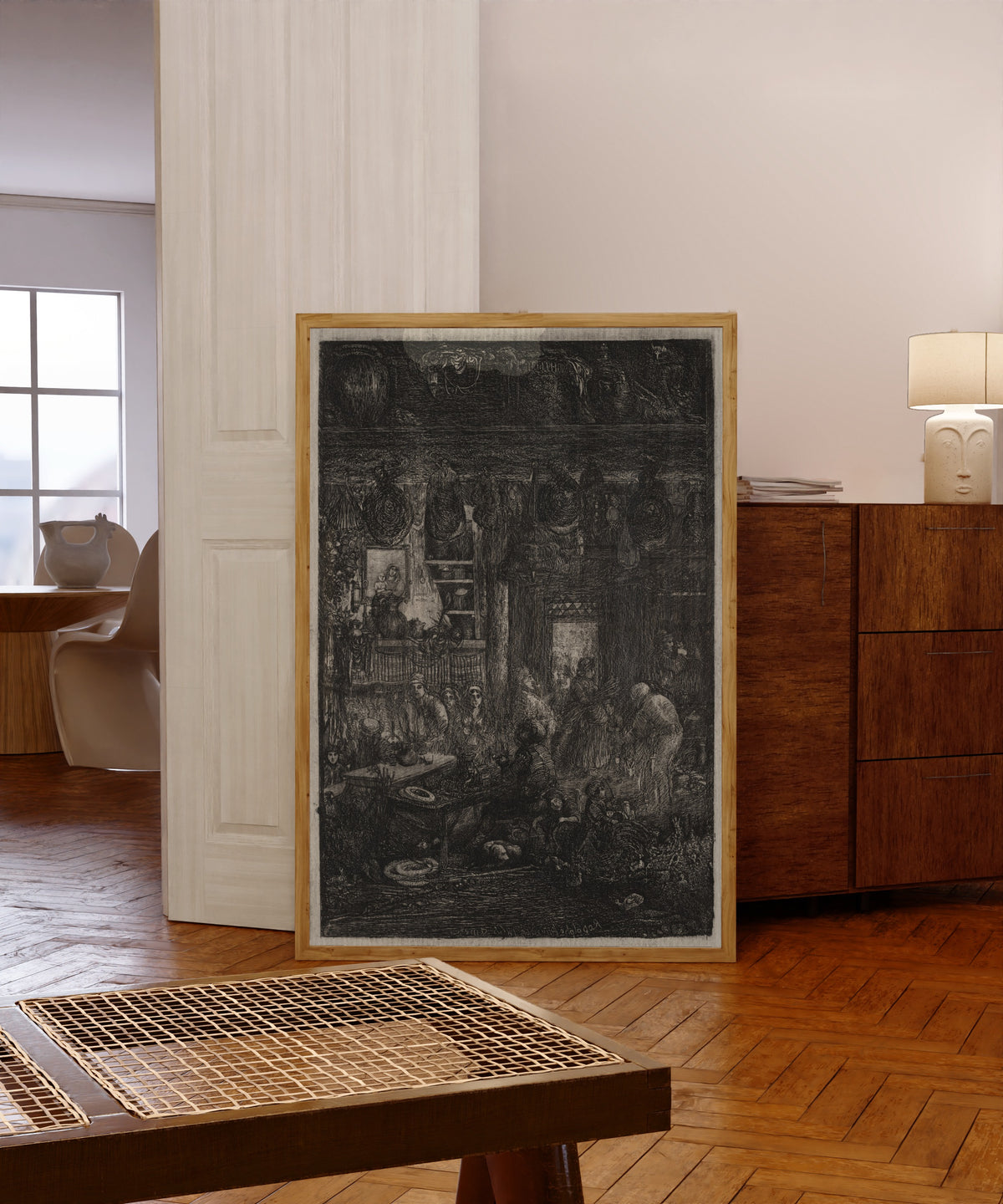Framed art print of Moldavian Interior by Rodolphe Bresdin, in a light wood frame leaning in a warm room with a parquet floor