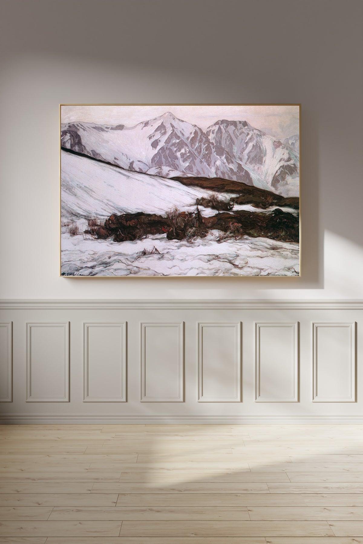 Framed art print of Mount Hakubayari by Hiroshi Yoshida, on a panelled wall in afternoon light