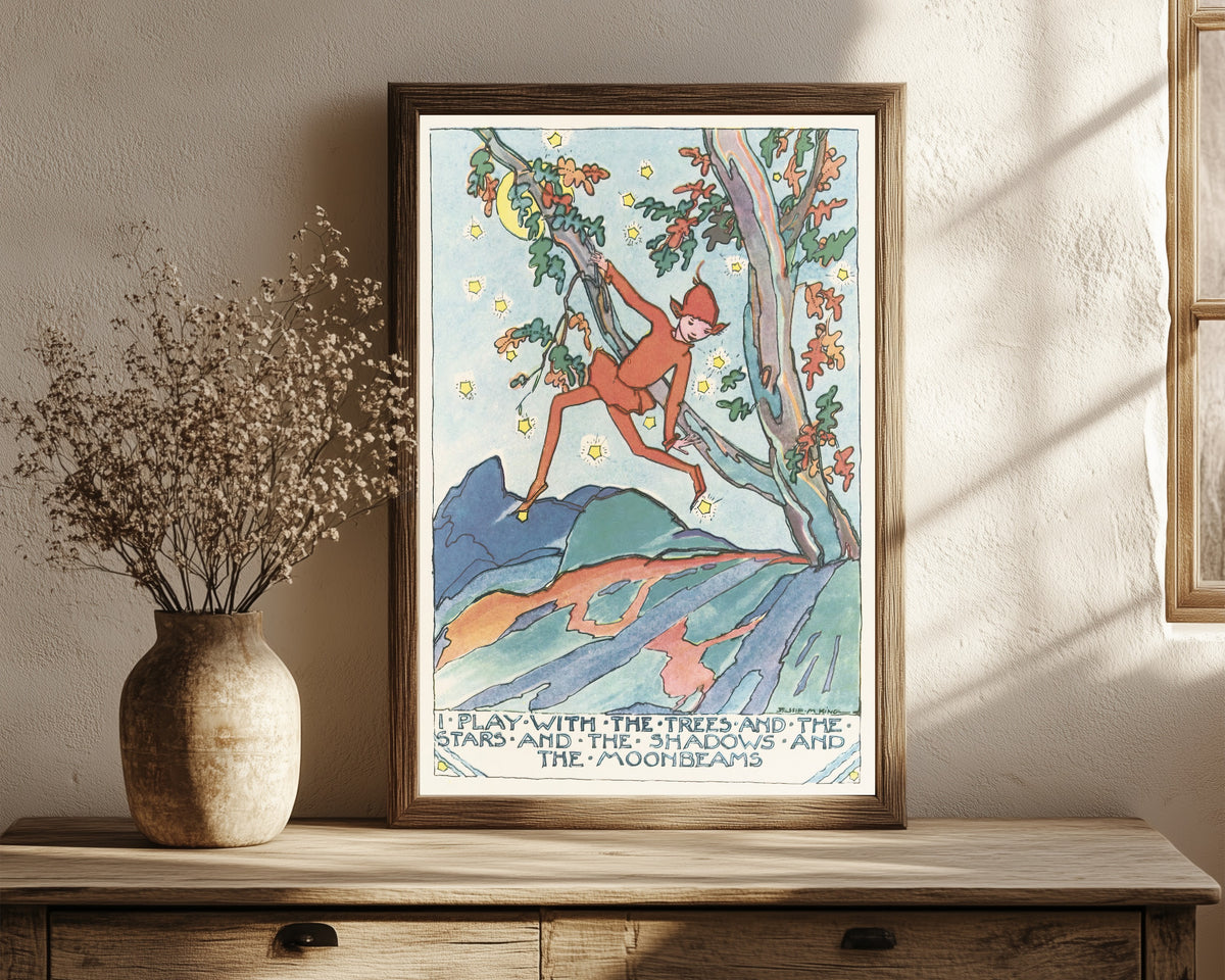 Framed art print of Mummy's Bedtime Story Book: I Play with the Trees… by Jessie M. King, in a dark wood frame leaning on a rustic console beside dried flowers