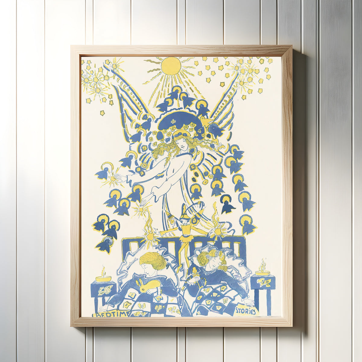 Framed art print of Mummy's Bedtime Story Book: Plate 14 by Jessie M. King, in a light wood frame on a white panelled wall