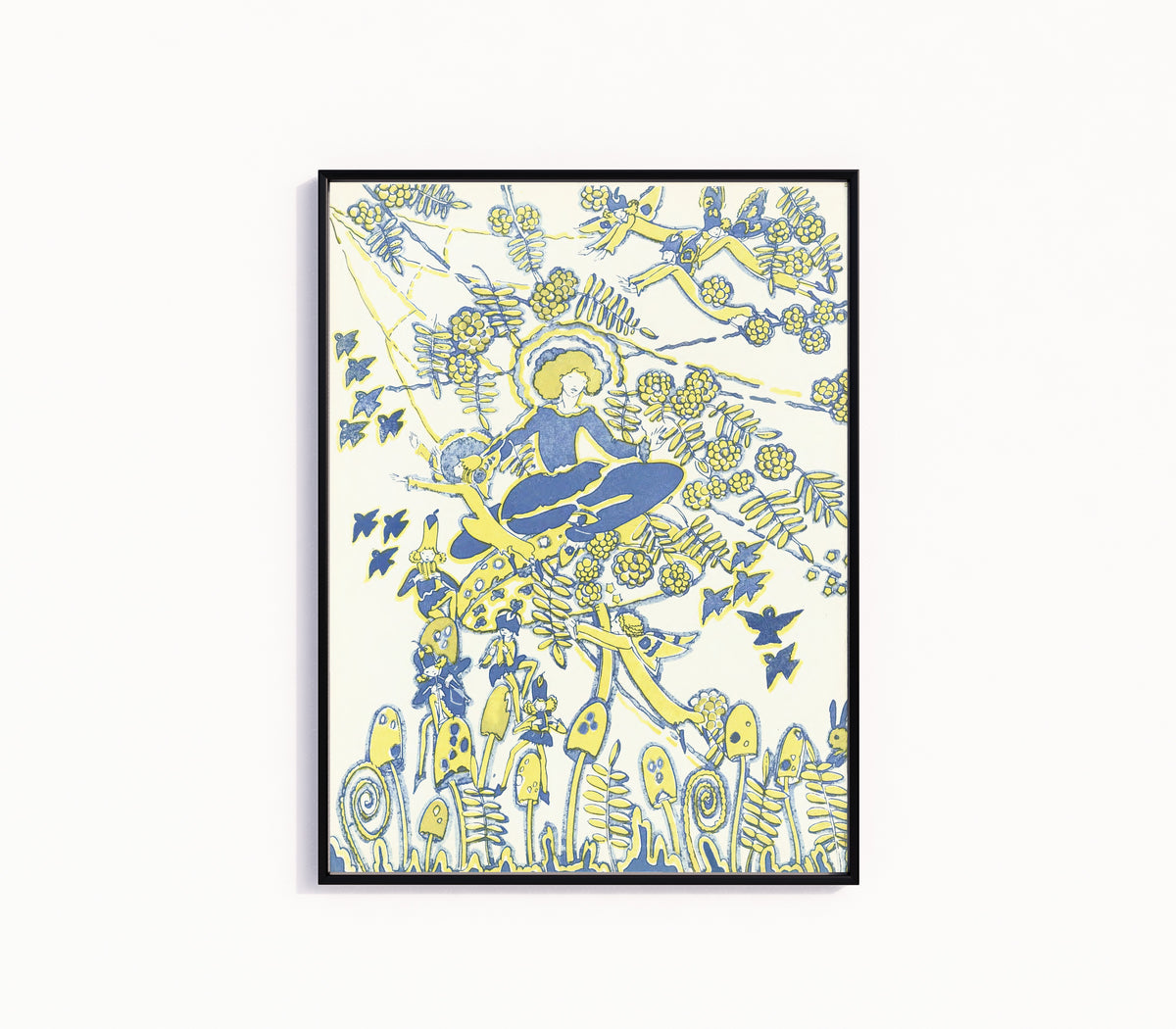 Framed art print of Mummy's Bedtime Story Book: Plate 7 by Jessie M. King, in a slim black frame on a plain white wall