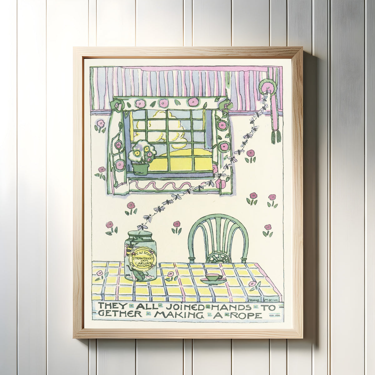 Framed art print of Mummy's Bedtime Story Book: They All Joined Hands Together Making a Rope by Jessie M. King, in a light wood frame on a white panelled wall