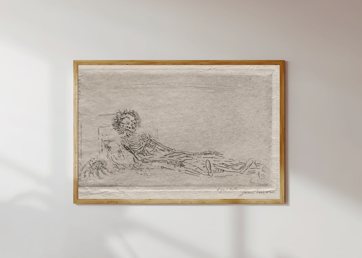 Framed art print of My Portrait in the Year 1960 by James Ensor, in a light wood frame on a sunlit white wall