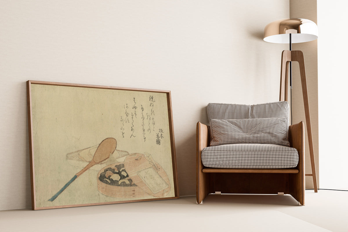 Framed art print of Nanairo Zazenmame by Katsushika Hokusai, leaning against a wall beside an armchair and a floor lamp