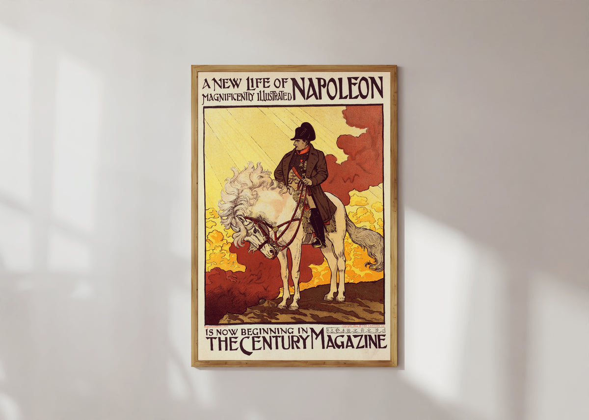 Framed art print of Napoléon by Eugène Grasset, in a light wood frame on a sunlit white wall