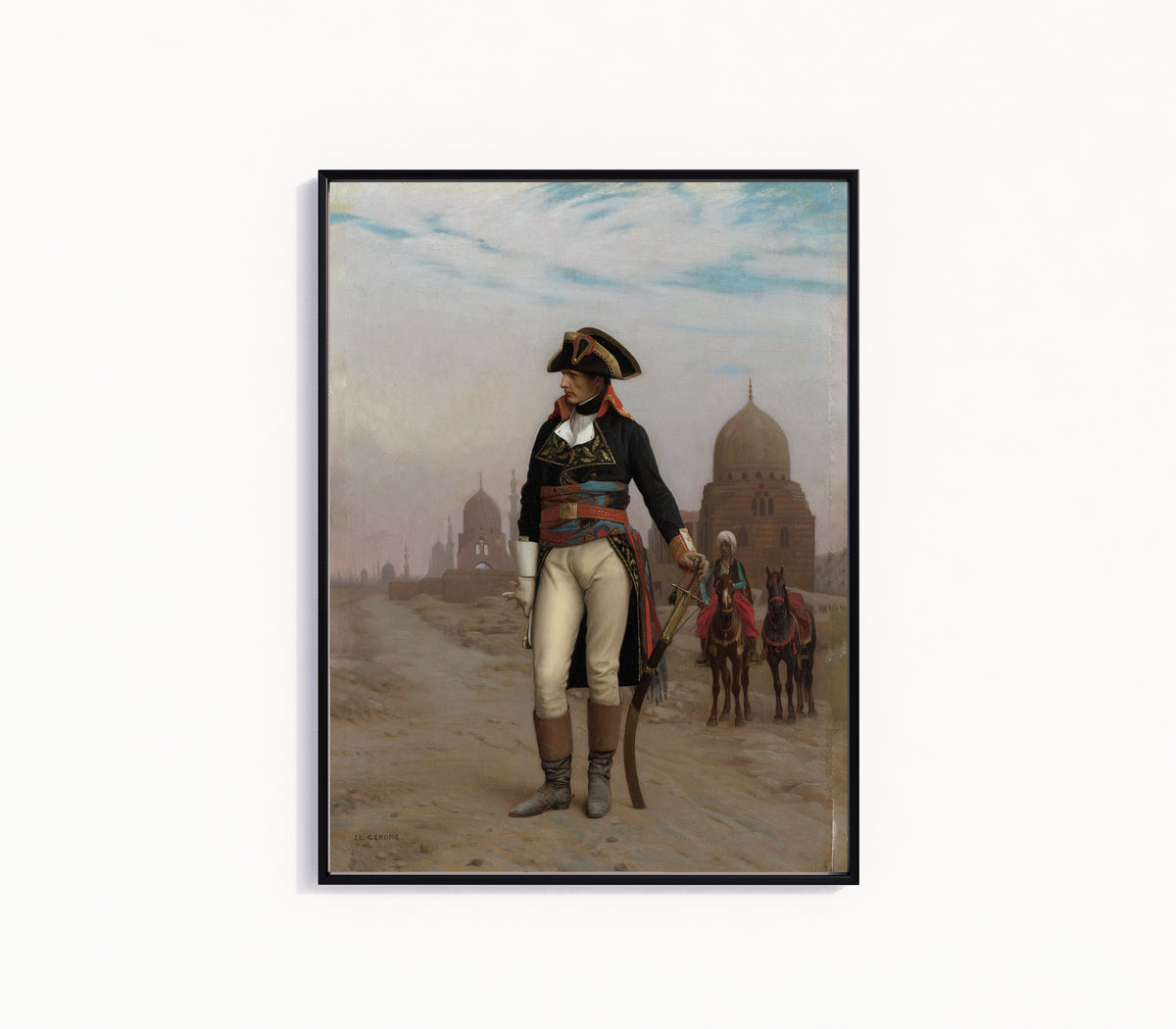 Framed art print of Napoleon in Egypt by Jean-Léon Gérôme, in a slim black frame on a plain white wall