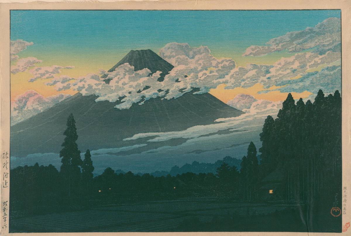Near Susono by Kawase Hasui — A dark mountain among pink-tinged clouds over a forest