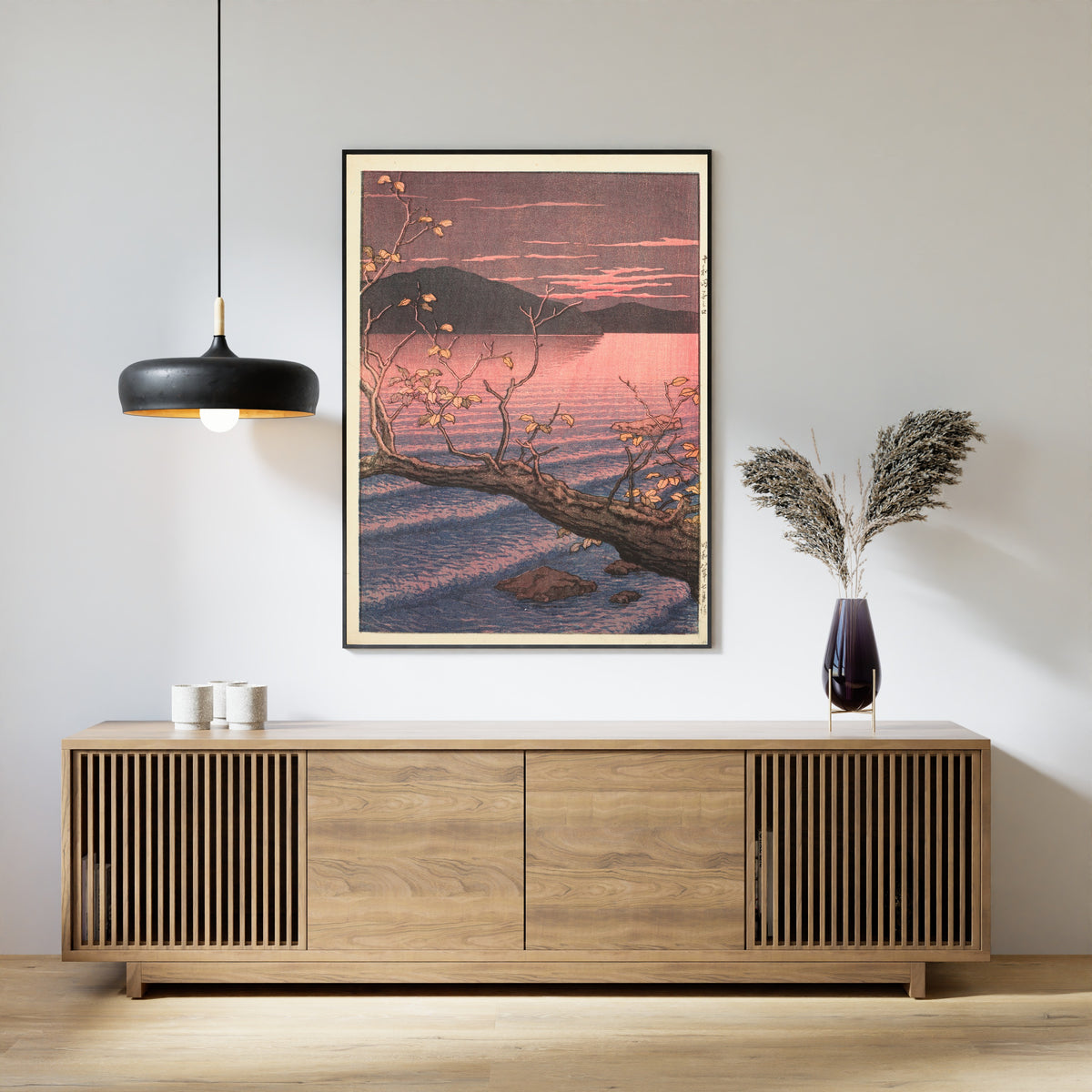 Framed art print of Nenokuchi, Lake Towada by Kawase Hasui, above a slatted wood sideboard