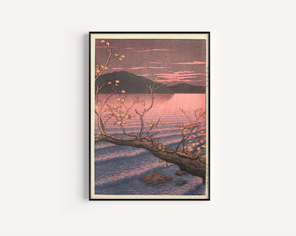 Framed art print of Nenokuchi, Lake Towada by Kawase Hasui, in a slim black frame on a plain white wall