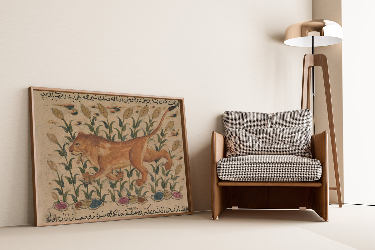 Framed art print of Nuzhatnama-i ‘Ala’i: A Lion, leaning against a wall beside an armchair and a floor lamp