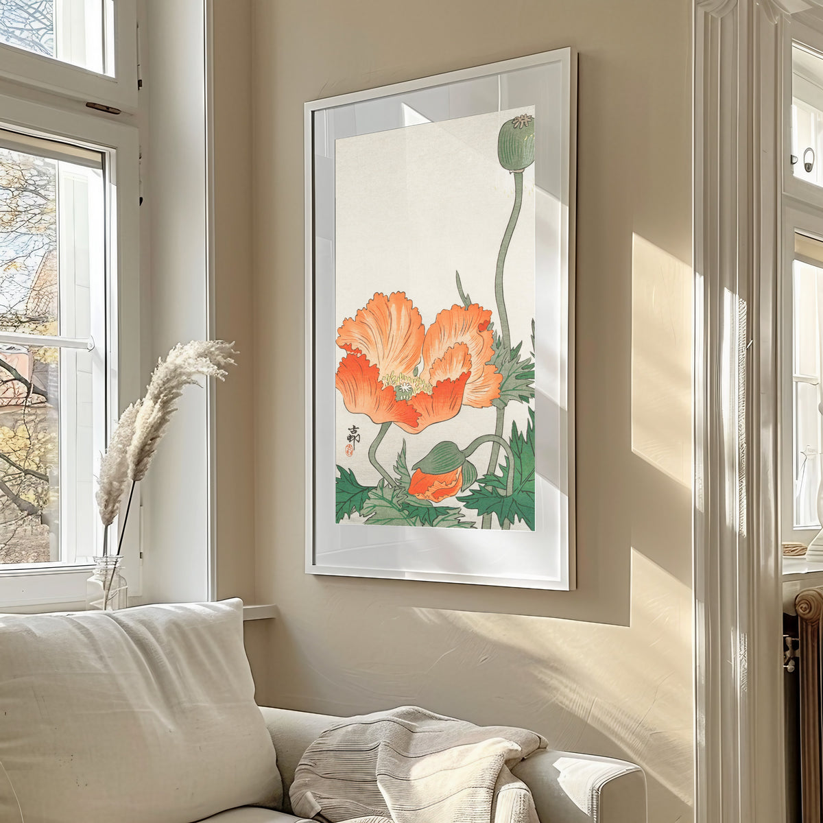 Poppies by Ohara Koson — framed in a sunlit living room above a sofa
