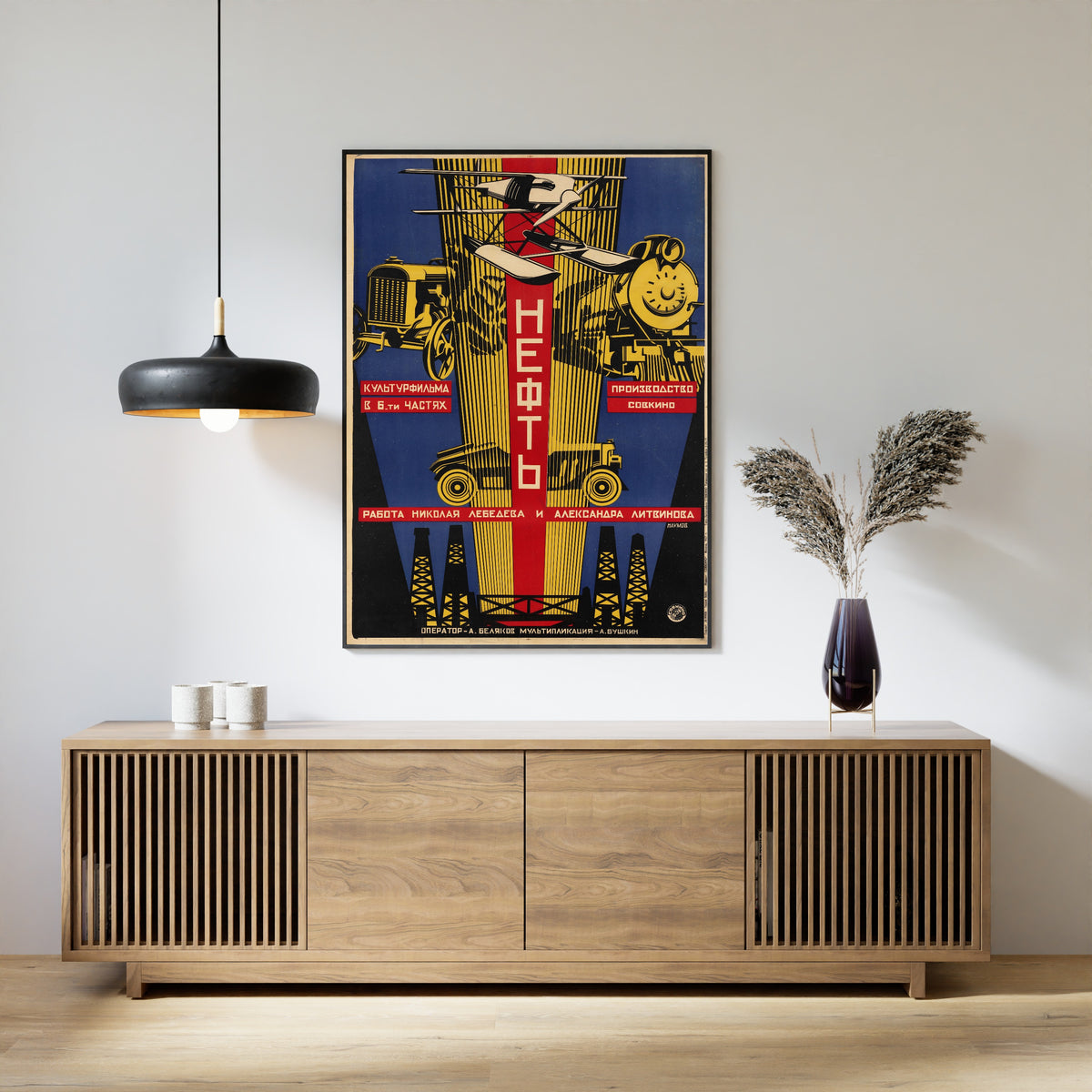 Framed art print of Oil by Alexander Naumov, above a slatted wood sideboard