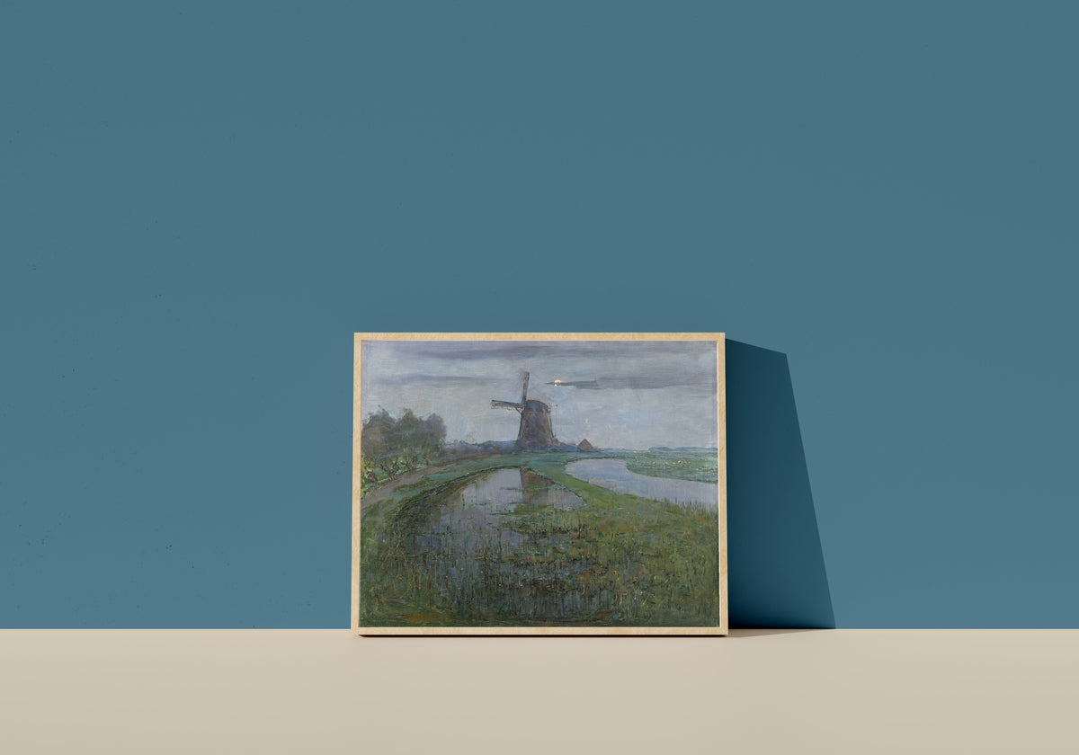 Framed art print of Oostzijdse Mill along the River Gein by Moonlight by Piet Mondrian, in a light wood frame leaning on a blue wall