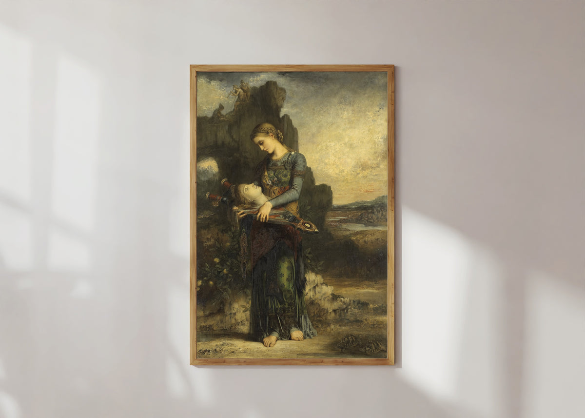 Framed art print of Orpheus by Gustave Moreau, in a light wood frame on a sunlit white wall