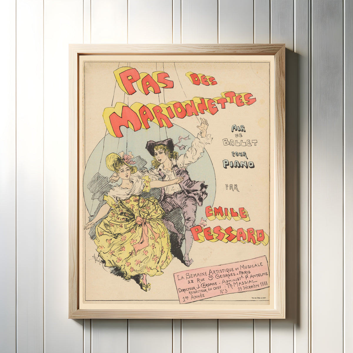 Framed art print of Pas des marionnettes, air de ballet pour piano par Émile Pessard by Théophile Steinlen, in a light wood frame on a white panelled wall