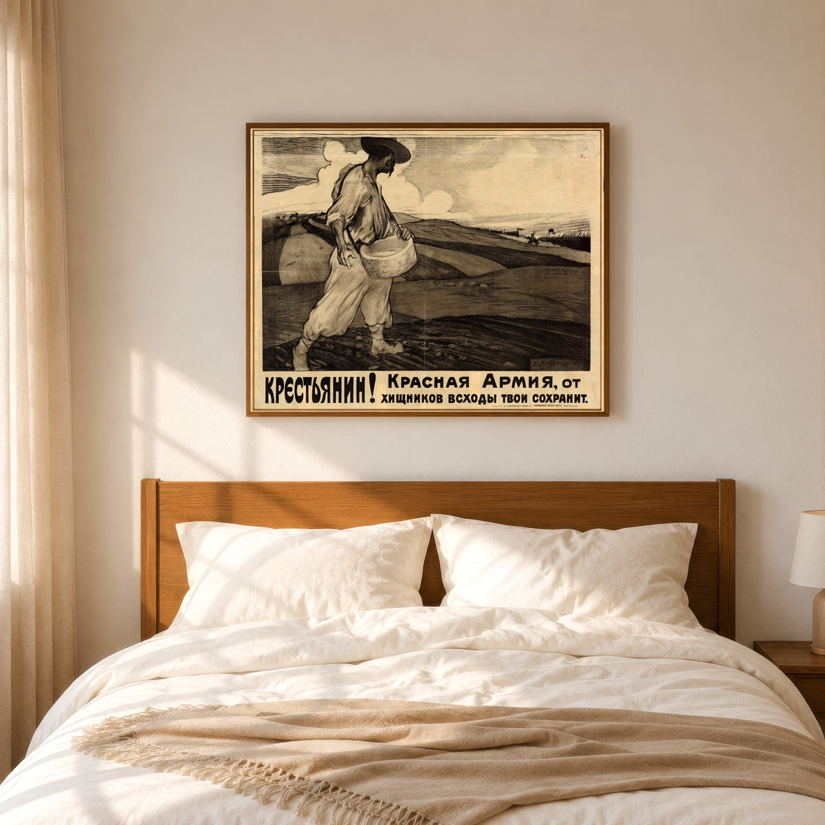 Framed art print of Peasant! The Red Army will protect your crops from the… by Vasily Kostyanitsyn, in a slim wood frame above a bed in a sunlit bedroom