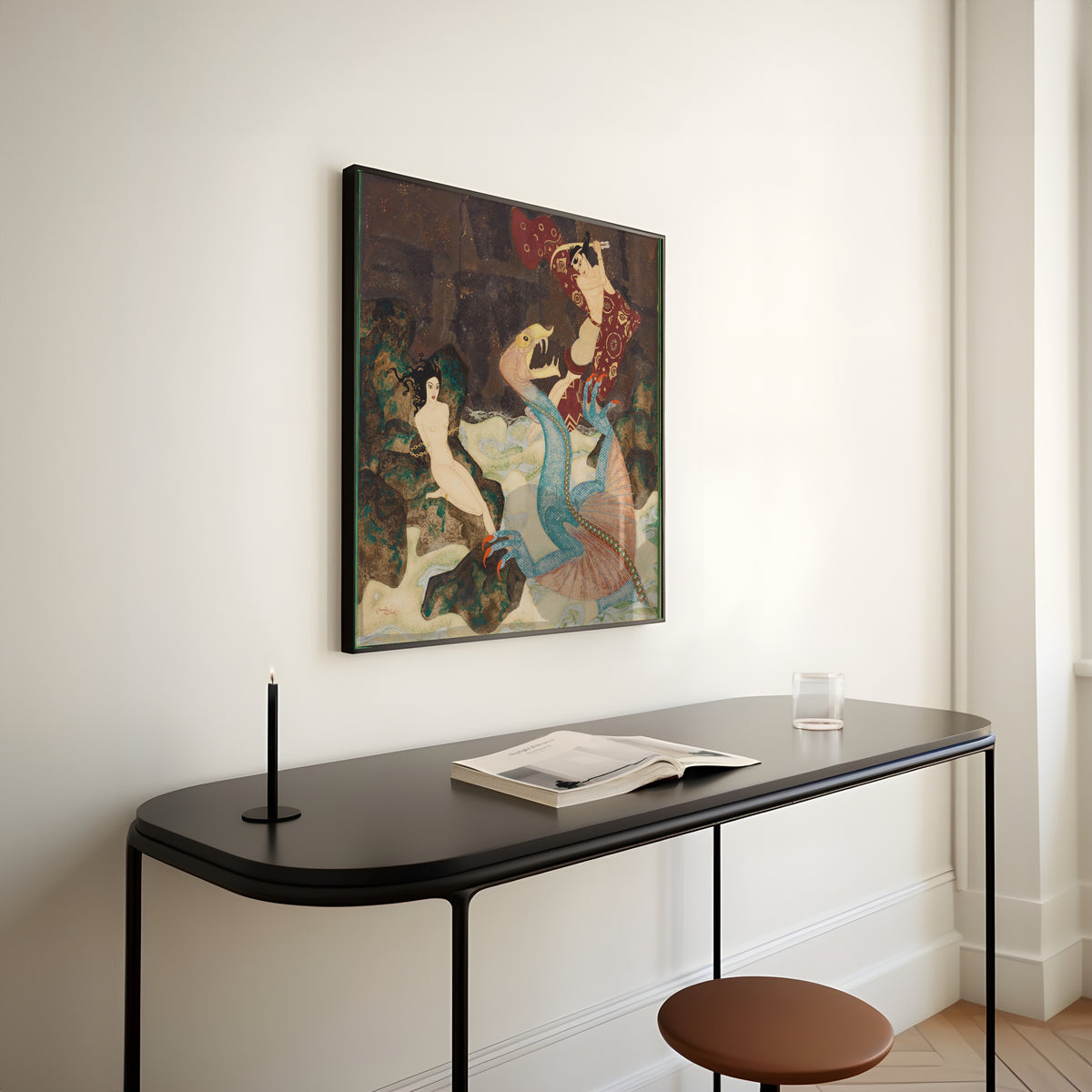 Framed art print of Perseus and Andromeda by Edmund Dulac, above a slim black console table