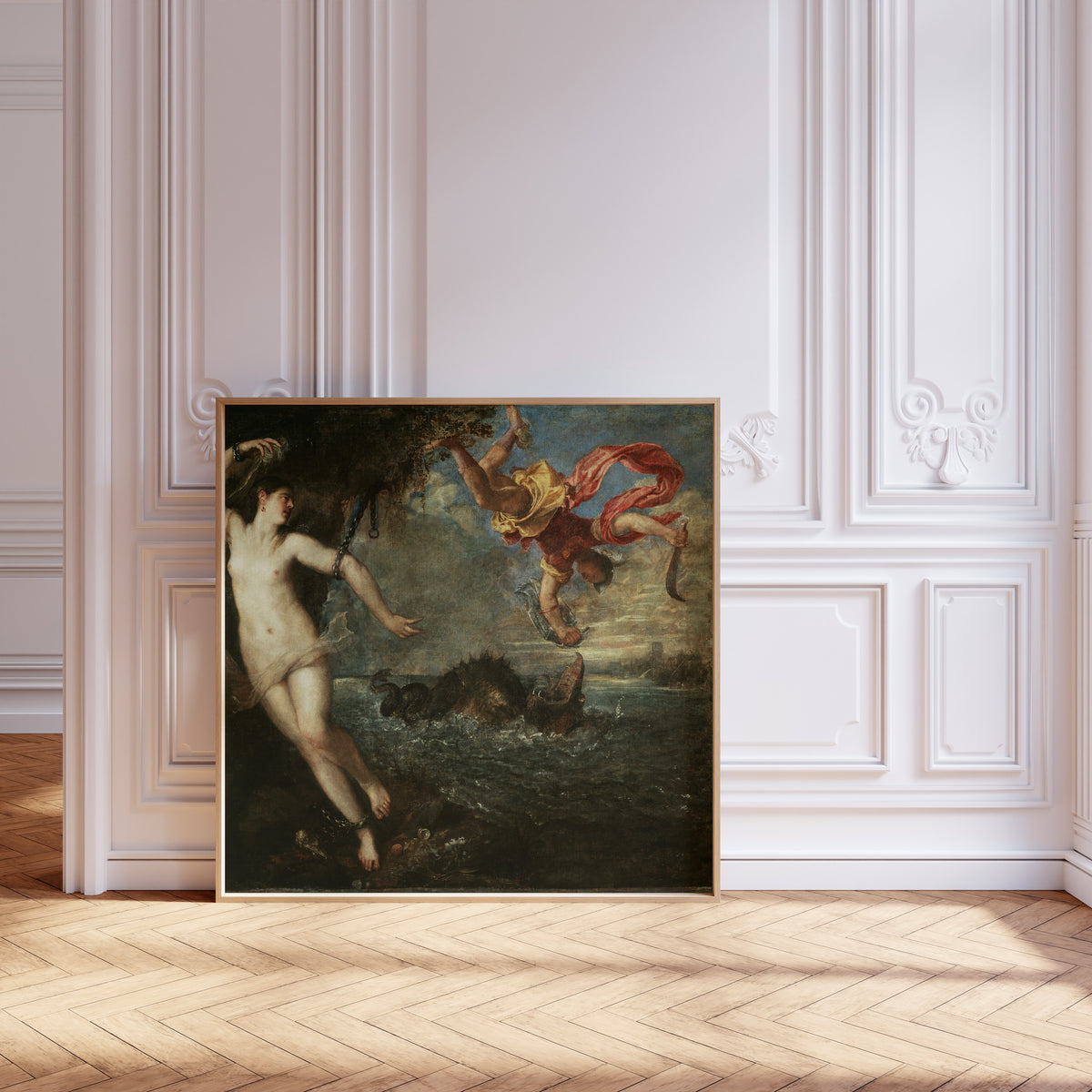 Framed art print of Perseus and Andromeda by Titian, leaning against pale pink panelling on a herringbone floor