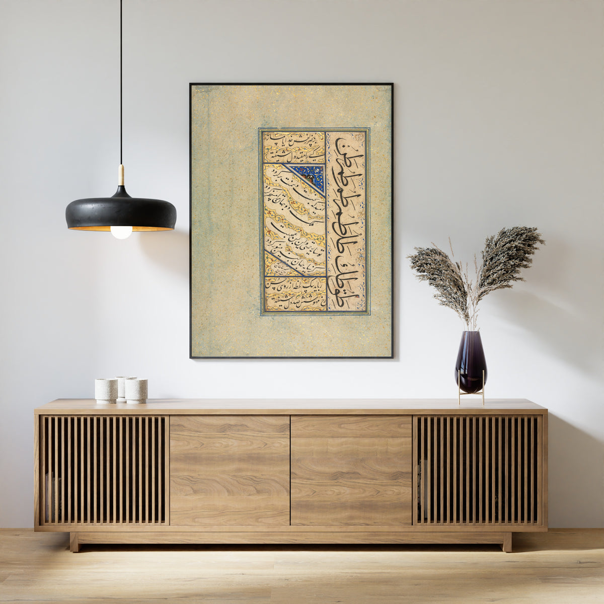 Framed art print of Persian Quatrains (Rubayi) and Calligraphic Exercises by Sultan Muhammad Khandan, above a slatted wood sideboard