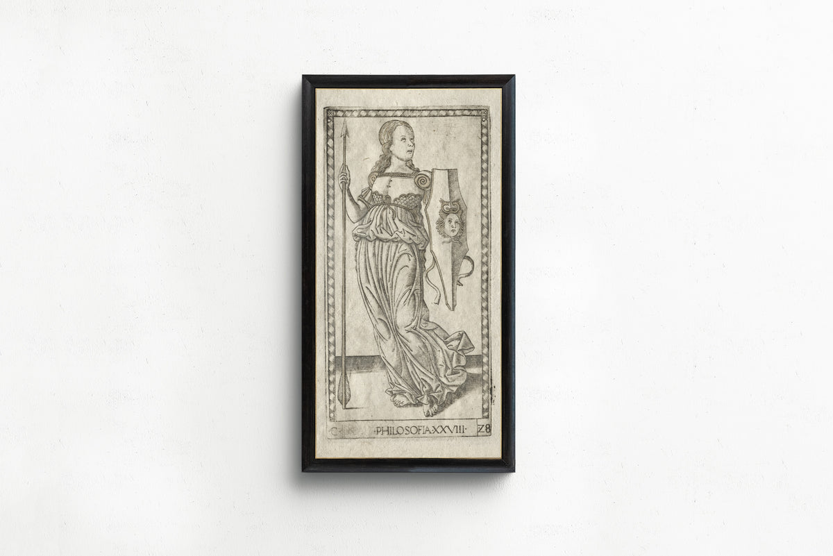 Framed art print of Philosophy (from the Tarocchi, Series C: Liberal Arts, no.… by Master of the E-Series Tarocchi, in a slim black frame on a plain white wall